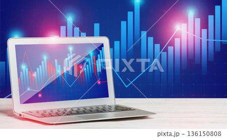 Trading chart displayed on a laptop showing market data trends 136150808