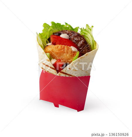 Freshly prepared wrap with vegetables and meat served on a plain background Freshly prepared wrap with vegetables and meat served on a plain background 136150926