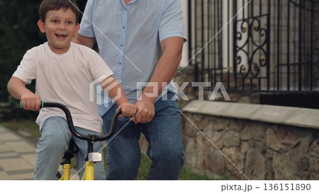 father teaches child ride bike, mother father, adrenaline horse riding, boy laughs smiling sitting bike outdoors, child riding father mother nature, together riding child kid bike, horse riding, walk father teaches child ride bike, mother father, adrenaline horse riding, boy laughs smiling sitting bike outdoors, child riding father mother nature, together riding child kid bike, horse riding, walk 136151890