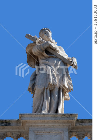 St. Charles Borromeo, fragment of colonnade of St. Peters Basilica in Rome, Italy 136153033