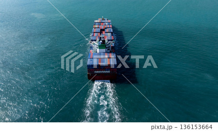 Aerial view container ship carrier container on the sea, Global business logistics and Global trade transportation, Container ship freight shipping import export logistics supply chain. Aerial view container ship carrier container on the sea, Global business logistics and Global trade transportation, Container ship freight shipping import export logistics supply chain. 136153664