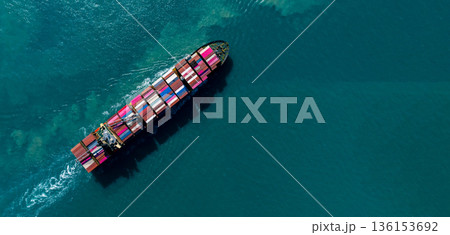Aerial view container ship carrier container on the sea, Global business logistics and Global trade transportation, Container ship freight shipping import export logistics supply chain. Aerial view container ship carrier container on the sea, Global business logistics and Global trade transportation, Container ship freight shipping import export logistics supply chain. 136153692
