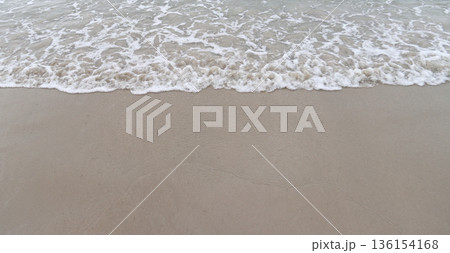 Water from the sea reaching the shoreline Water from the sea reaching the shoreline 136154168