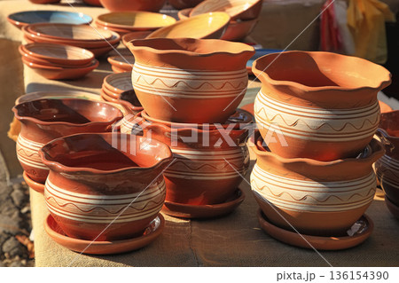 Chisinau, Moldova - October 15,2022: City Day. Ceramic dishes handmade. Chisinau, Moldova - October 15,2022 136154390