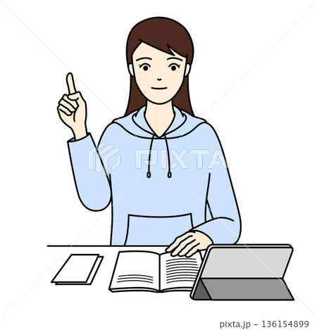 タブレット学習中に重要なポイントを指し示す真剣な女性 タブレット学習中に重要なポイントを指し示す真剣な女性 136154899