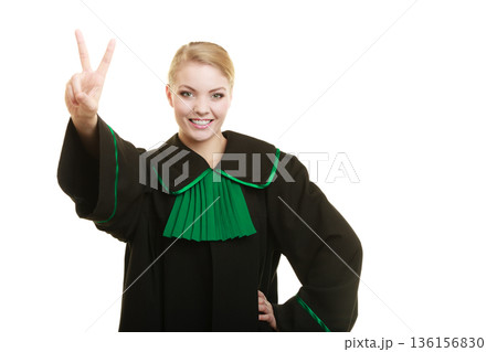 Woman lawyer making victory hand sign 136156830