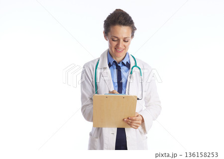 Doctor Writing Medical Prescription on Clipboard 136158253