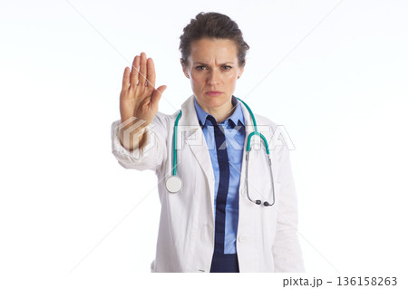 Female Physician Making Serious Stop Gesture Female Physician Making Serious Stop Gesture 136158263