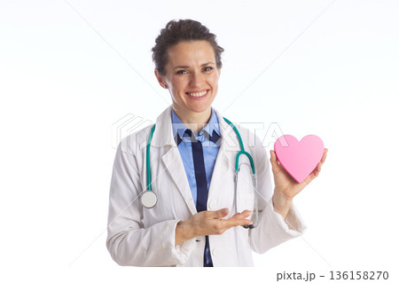 Female Doctor Pointing to Heart Symbol 136158270