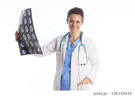 Confident Female Physician with Medical X-ray Scans 136158434