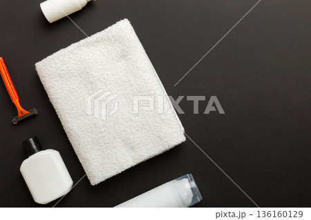 shaving man set. shaving machine, towel, lotion and shaving foam on colored background. Men bath Accessories top view shaving man set. shaving machine, towel, lotion and shaving foam on colored background. Men bath Accessories top view 136160129