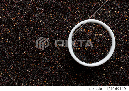 black quinoa grain in wooden bowl background and texture of gluten free top view black quinoa grain in wooden bowl background and texture of gluten free top view 136160140
