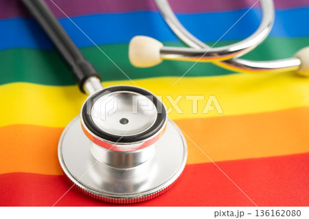 Stethoscope on LGBT rainbow flag, rights and gender equality. Stethoscope on LGBT rainbow flag, rights and gender equality. 136162080