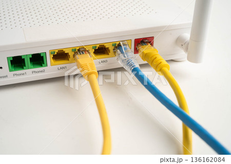 Ethernet cable with wireless router connect to internet service provider network. Ethernet cable with wireless router connect to internet service provider network. 136162084