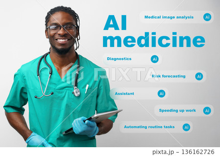 Healthcare worker smiling while holding a tablet and wearing medical scrubs in a clinic Healthcare worker smiling while holding a tablet and wearing medical scrubs in a clinic 136162726