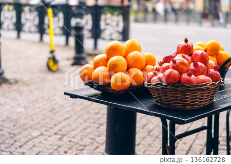 Fresh fruits on a street table in an urban market during daylight hours Fresh fruits on a street table in an urban market during daylight hours 136162728