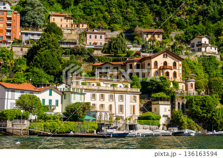 Multicolor houses building architecture on lake Como Italy city. 136163594