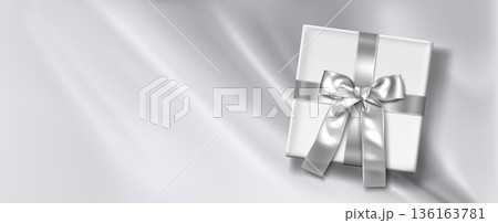 Silver silk background, white gift box, satin ribbon 136163781