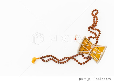 Damru drum and rudraksha mala with spiritual meaning Damru drum and rudraksha mala with spiritual meaning 136165329