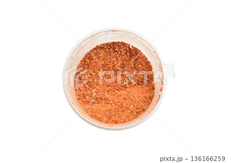 A cooking spice, hot ground chili pepper. 136166259