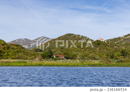 Rijeka Crnojevica, Montenegro. A tranquil riverside scene 136166554