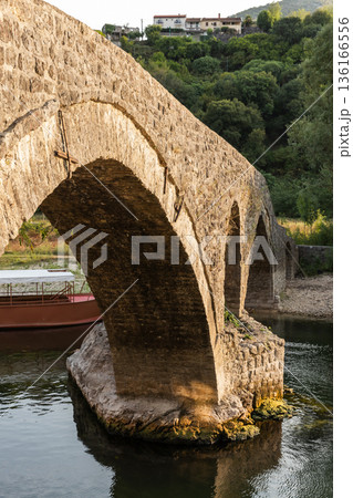 Rijeka Crnojevica bridge, Montenegro. Vertical photo 136166556