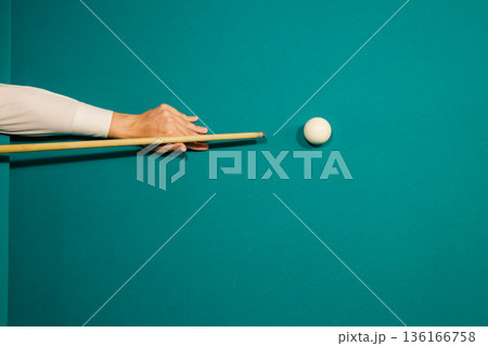 Billiard player play snooker on pool table. Billiard player play snooker on pool table. 136166758