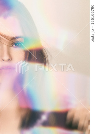 Woman experiencing prism light flares and colorful bokeh 136166790