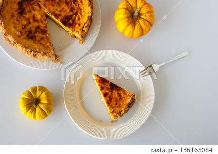 Slice of Homemade Pumpkin Cheesecake 136168084