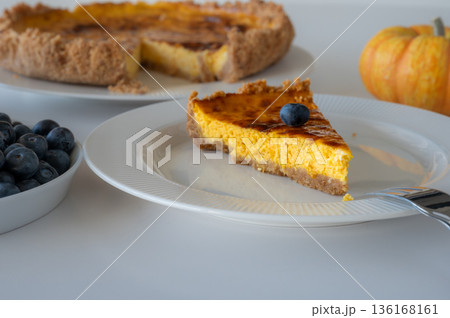 Slice of Homemade Pumpkin Cheesecake Slice of Homemade Pumpkin Cheesecake 136168161