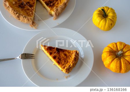 Slice of Homemade Pumpkin Cheesecake Slice of Homemade Pumpkin Cheesecake 136168166