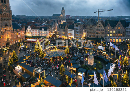 Christmas market decorated and illuminated in Bruges, Belgium. 136168221