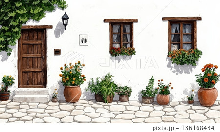Charming White House with Wooden Door and Flower Pots on a Cobblestone Pathway Charming White House with Wooden Door and Flower Pots on a Cobblestone Pathway 136168434