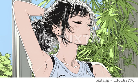 朝の目覚ましを止めて伸びをしている若い女性