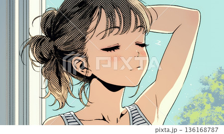 朝の目覚ましを止めて伸びをしている若い女性