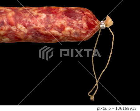 Sausage on a black background. Sausage on a black background. 136168915