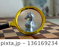 close-up of a  golden chess piece,  knight 136169234