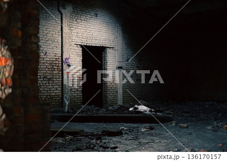 Abandoned Industrial Interior With Dark Doorway Abandoned Industrial Interior With Dark Doorway 136170157