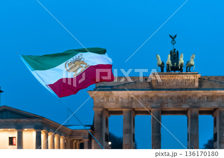 Iranian flag during demonstration in support of Iran near Brandenburg Gate Iranian flag during demonstration in support of Iran near Brandenburg Gate 136170180