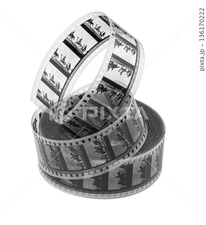 Film reel showing vintage black and white movie frames 136170222