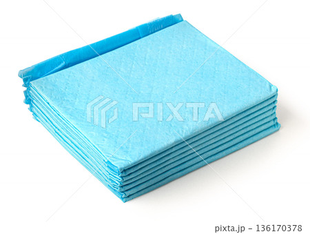 Stack of blue absorbent pet training pads 136170378