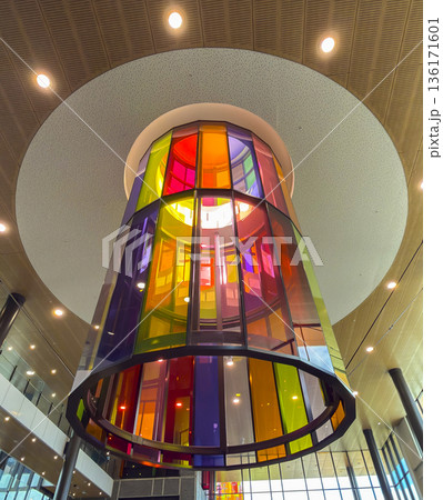 Photograph of a colourful lighting structure inside the lobby of a building 136171601