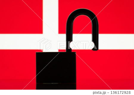 Flag of Denmark behind open lock silhouette. Concept of freedom, end of restrictions, bans, open Denmark country Flag of Denmark behind open lock silhouette. Concept of freedom, end of restrictions, bans, open Denmark country 136172928