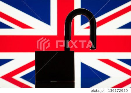 Flag of Great Britain behind open lock silhouette. Concept of freedom, end of restrictions, bans, open Great Britain 136172930