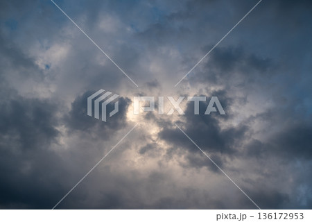 Dramatic dark clouds in sky. Evening shot of bright stormy clouds, beautiful cloudscape Dramatic dark clouds in sky. Evening shot of bright stormy clouds, beautiful cloudscape 136172953