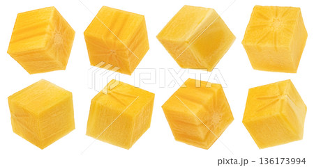 Persimmon fruit cubes, fresh kaki pulp slices isolated on white background, full depth of field 136173994