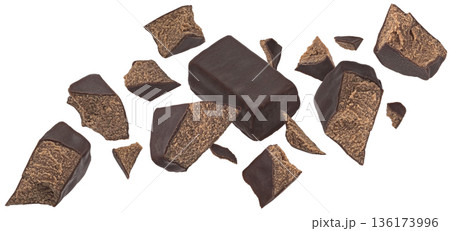 Falling chocolate candy pieces isolated on white background, full depth of field 136173996