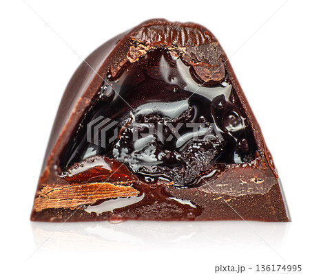 Chocolate candy cross section with liquid chocolate filling isolated on white 136174995