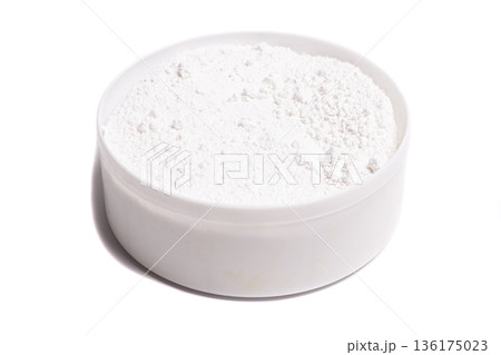 Tooth powder in jar isolated on white Tooth powder in jar isolated on white 136175023