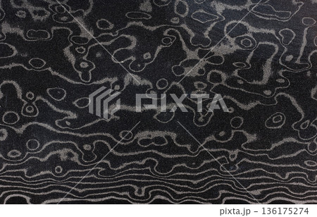 Fragment of a Damascus steel knife, full frame 136175274